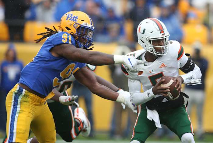 Jones II sacks Miami Hurricanes quarterback N'Kosi Perry in a 2019 game.